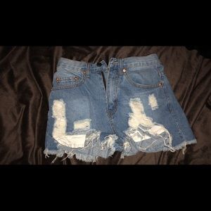 High waisted Light Blue destroyed denim shorts